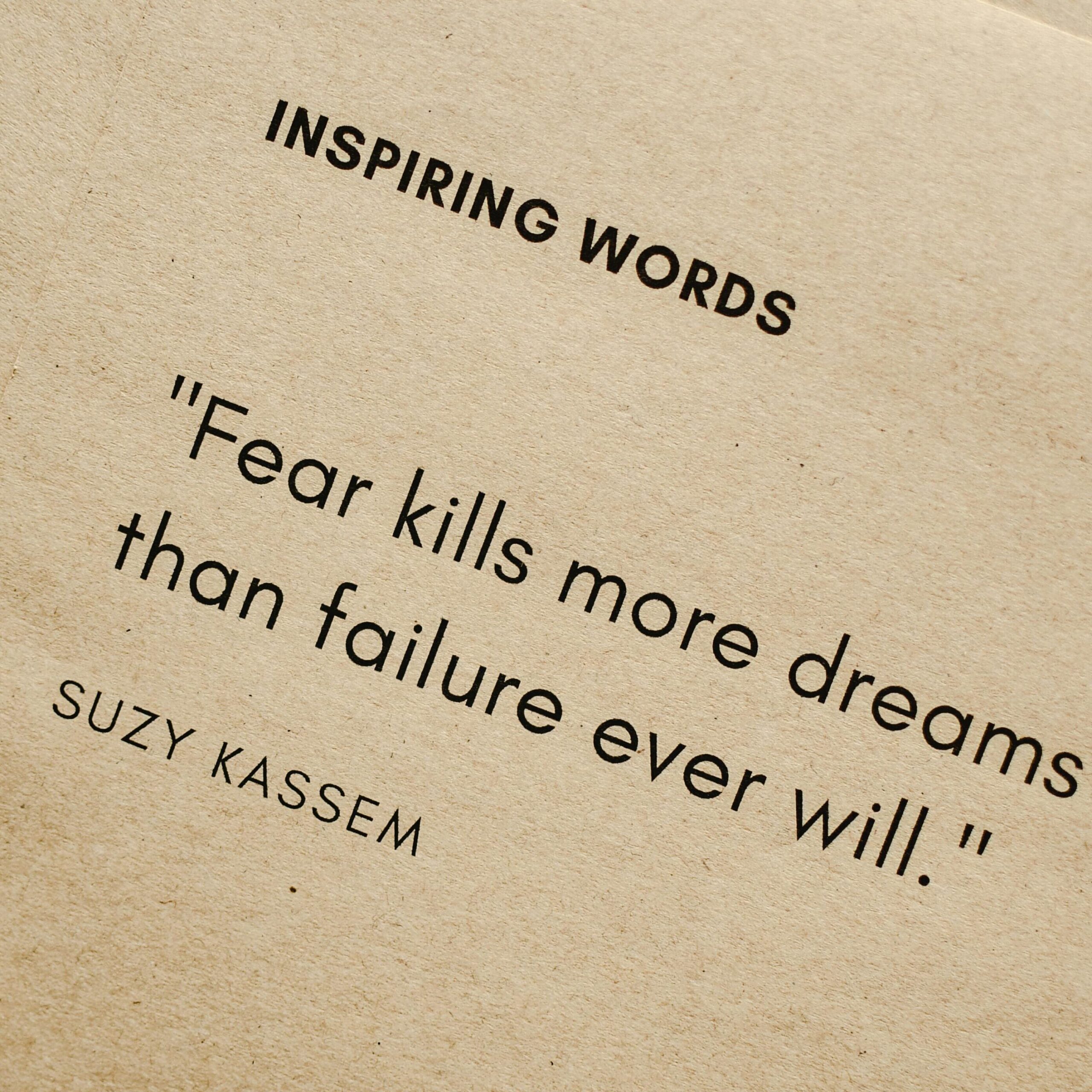 In a brown paper a famous quote is written "Fear kills more dreams than failure ever will."